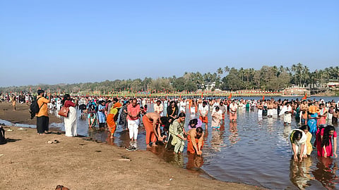 Devotees bathing at Bharatapuzha in Tirunavaya as part of Maha Maghamahotsavam, celebrated as Kerala's Kumbh Mela.