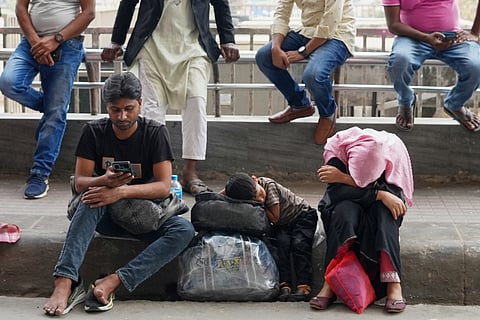 Passengers whose flights were cancelled, wait at the departure terminal of Rafik Hariri International Airport in Beirut, Lebanon, Saturday, Feb. 28, 2026, as many airlines canceled flights due to the conflict involving the United States, Israel and Iran.