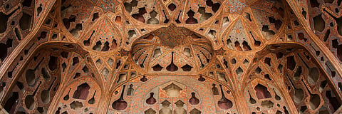 The ornate ceiling of the Ali Qapu Palace in Isfahan, Iran. It’s a UNESCO Heritage site that began construction in the 1500s and has been damaged by U.S.-Israeli strikes on Iran.