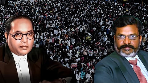 A stylised image of Dr Ambedkar and Thol Thirumavalavan against the background of a huge crowd