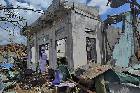 This handout photo provided by Palaung Land shows debris of the buildings destroyed in an explosion in Kaungtup village, Namhkam township, Shan State, Myanmar, on Sunday, May 31, 2026.