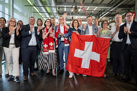 Members of the Federal Parliament and other representatives of civic organizations, celebrate during a get together of a cross-party alliance against the SVP's popular initiative "No 10-Million Switzerland" which the people and the cantons voted on this election Sunday, June 14, 2026, in Bern, Switzerland.