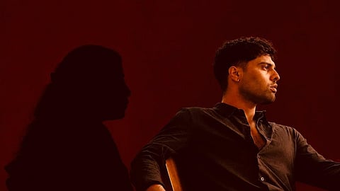 Representative image with a woman's silhouette to the left and Nandu Dinesh on the right