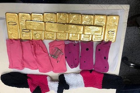 Woman held with 11 kg gold hidden in her leggings and socks at Hyderabad airport