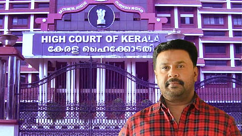 Actor Dileep in front of an image of the Kerala High Court building, with the court's name displayed prominently in English and Malayalam.