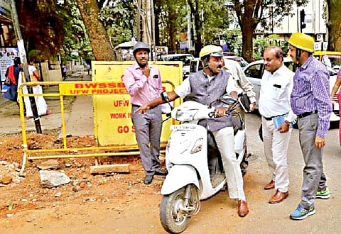 Riding two-wheeler, Bengaluru Mayor inspects potholes: One more engineer suspended