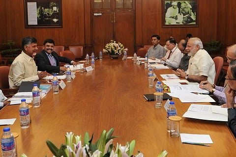 Commitments will be honoured, Modi assures Naidu