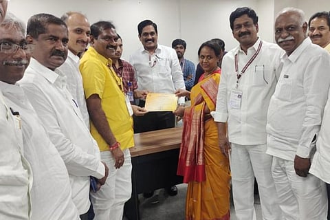 The newly elected MLC Anuradha with other party members