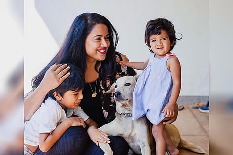 Sameera is seen along with her children in the image.