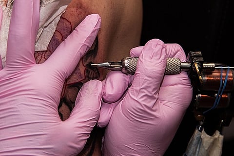 Australian with tattoo of a goddess heckled, forced to apologize to Bengaluru cops