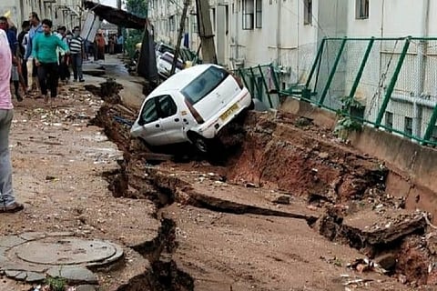 Road caves in due to heavy rains in West Bengaluru, 70 families shifted out