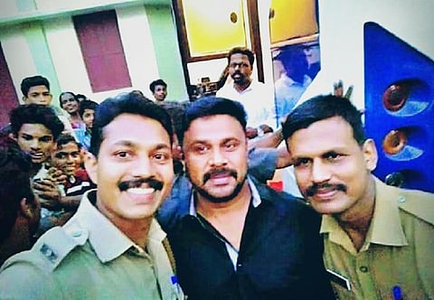Malayalam actor Dileep's 'selfie with cops' goes viral. Here's the truth