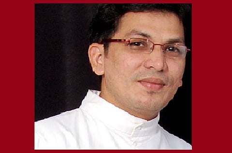 Fugitive Christian priest accused of rape surrenders in Aluva