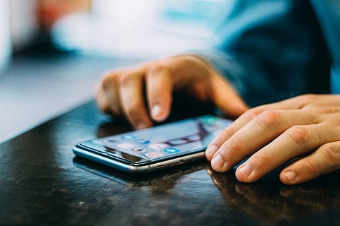 A person looking at their phone