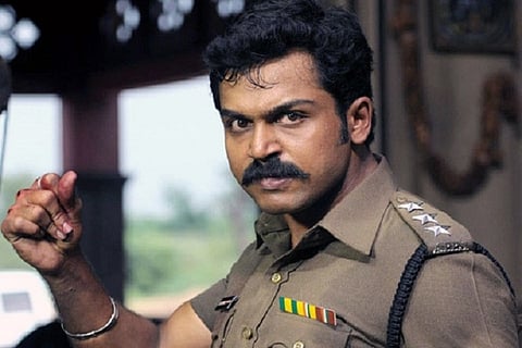 Karthi returns as cop with Dheeran – Adhigaaram Ondru