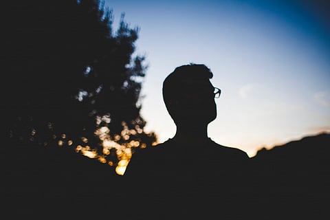 silhouette of a boy