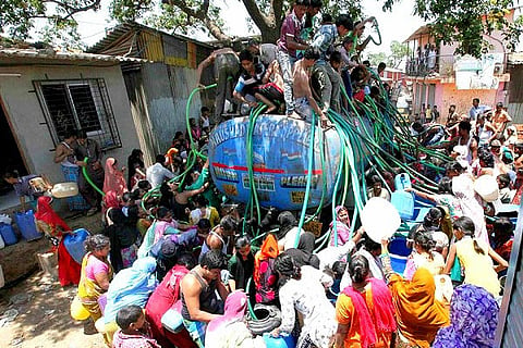 India is facing a water crisis, but these politicians waste water because they can't take dusty roads
