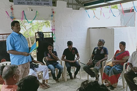 A group of AKS members sitting in a chair in circle in a event supporting inter-caste marriages in Tamil Nadu
