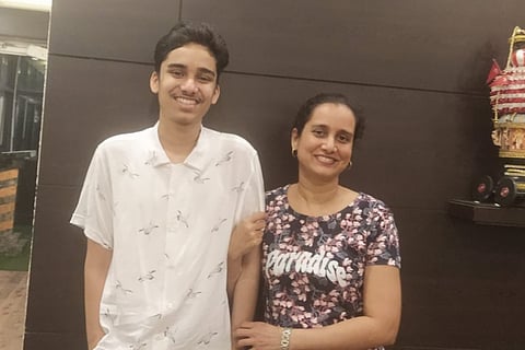 Picture of the deceased student Aditya Prabhu and his mother Asha