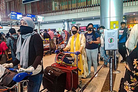 People in a queue at the airport