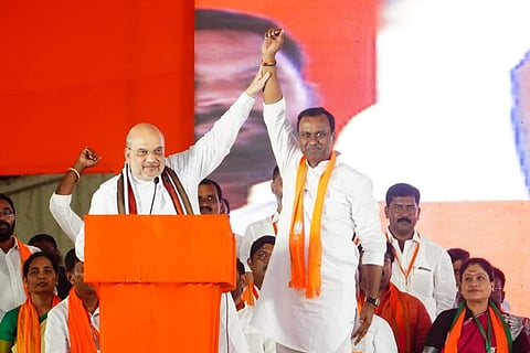 Amit Shah with Komatireddy Rajagopal Reddy at a public meeting in Munugode
