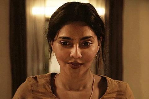 Aishwarya Lekshmi as Ammu, in a still from the Telugu film Ammu