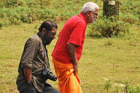 Anandatheertha Swami with journalist and filmmaker OK Johnny