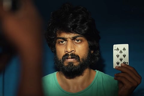 Andhaghaaram still showing actor Arjun Das