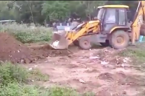 COVID victim moved using JCB tractor in Andhra