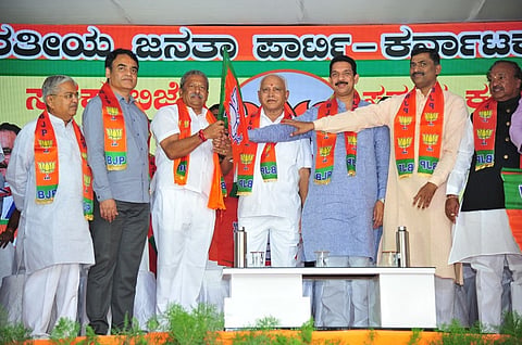 After denying hand in defections, BJP gives tickets to 13 disqualified MLAs for bye-polls