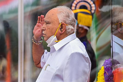 Yediyurappa resigns: A file image of BS Yediyurappa saluting after hoisting the Indian flag during Independence Day celebrations