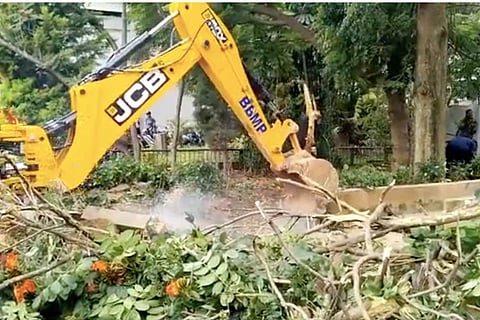 A BBMP bulldozer demolishing encroachments in Bengaluru