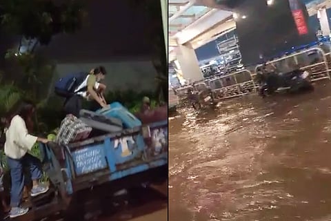 Bengaluru airport area flooded after heavy rains, stranded passengers use tractors