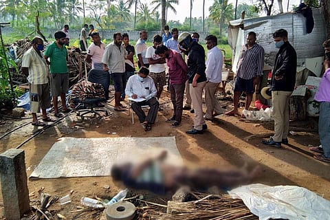 Crime scene photo of a man who died of alcohol overdose