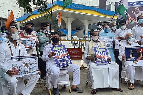 Congress protests against rise in petrol prices 100 not out led by DK Shivakumar and Siddaramaiah