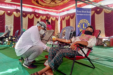 Blood donation exercise in a migrant labour settlement in Bengaluru