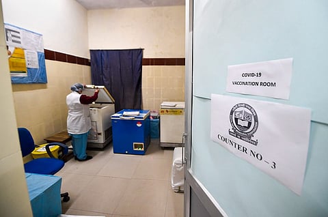 A medic in a room during dry run for COVID-19 vaccine