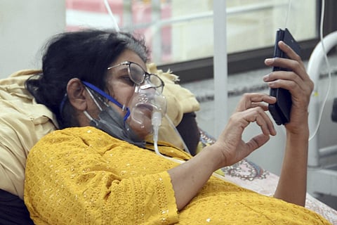 A woman on oxygen supply