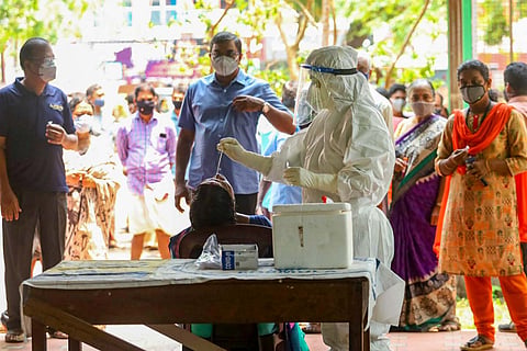 File photo of a health worker conducting a COVID test in India amid the coroanvirus pandemic