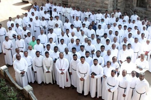 CSI priests pose in Munnar after attending retreat