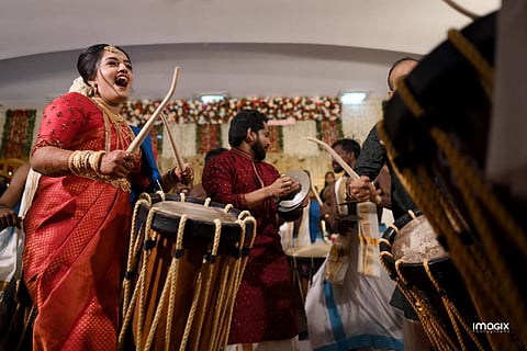 Shilpa Sreekumar and her husband Devanand performing during their wedding
