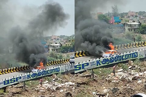 Dramatic visuals showed grey and black smoke billowing from the car parked on the Koyambedu flyover