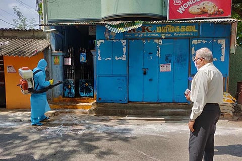 A workers spraying sanitizers in containment zones of Chennai