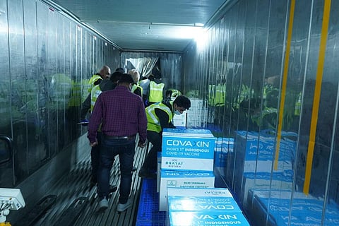 Health workers transporting Covaxin vaccine