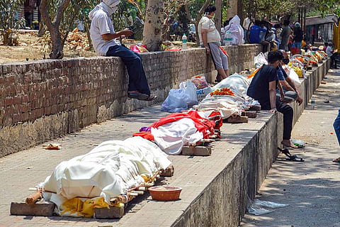 Bodies lined up at a crematorium