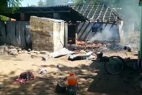 A roof of a cracker blast unit blown away and smoke engulfing the area.