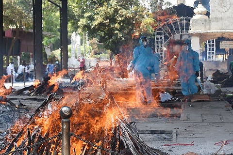 Cremation of COVID-19 victims in Delhi.