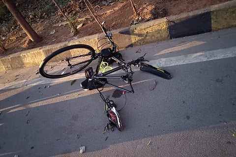 The damaged cycle lying on the road