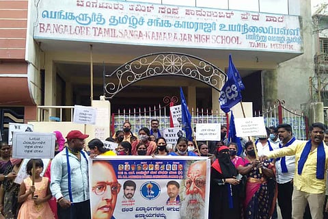 Parents and members of Ambedkar Dalit Sangarsh Samithi protesting in front of the school