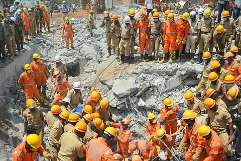 A mother held her daughter under the Dharwad building debris for over 24 hrs